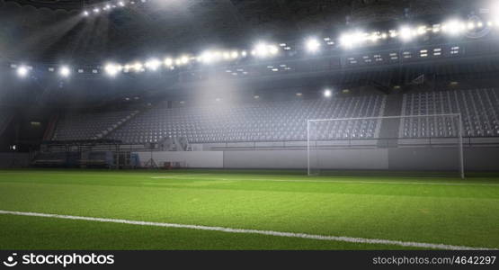 Football stadium in lights. Background image of empty soccer green field