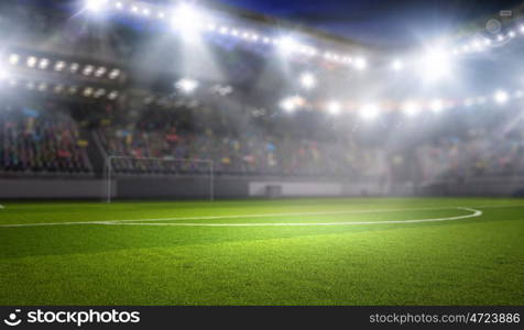 Football stadium in lights. Background image of empty soccer green field