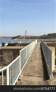 Footbridge accessing the penstocks of the overflow spillway in Vigia dam supplying drinking water to the county of Redondo, Alentejo, Portugal