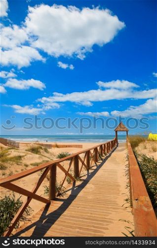 Footbridge of access to Cortadura&rsquo;s beach in Cadiz and paraglider. Cortadura&rsquo;s Beach - Cadiz