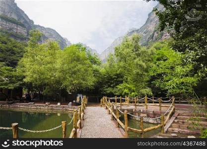 Footbridge over a pond, Taihang Grand Canyon, Linzhou, Henan Province, China