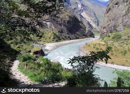 Footpath and mountain river in Nepal