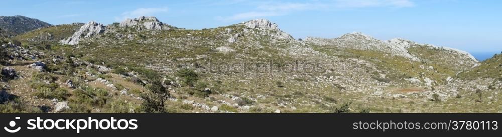 Footpath and rocky slopes on the Mediterranean coast of Turkey