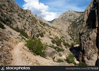Footpath in Kazankaya canyon in mountain region of Turkey