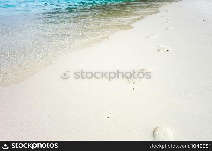 footprints on a tropical beach, Perhentian Islands, Malaysia. footprints on a tropical beach