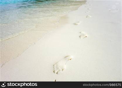 footprints on a tropical beach, Perhentian Islands, Malaysia. footprints on a tropical beach