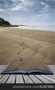 Footprints on empty beach Summer landscape conceptual book image