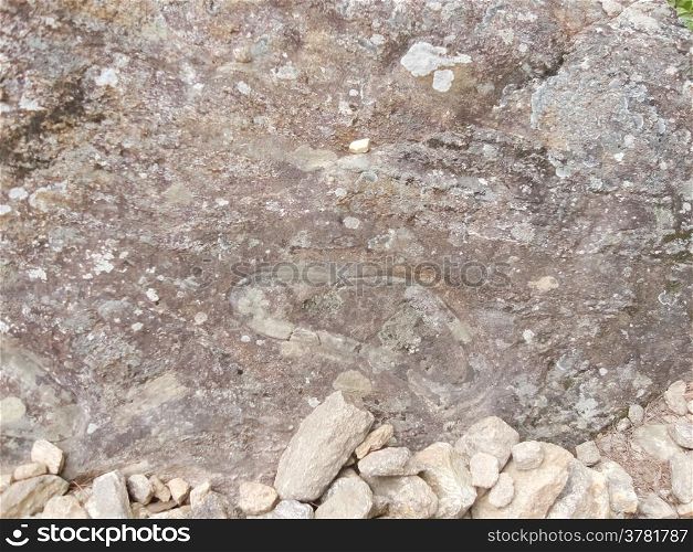 Footprints on rocks in Bhutan.