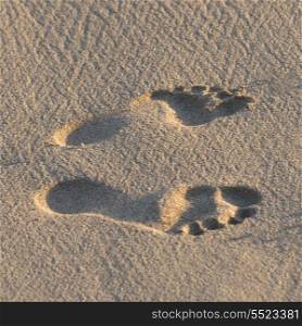 Footprints on the beach, Waikiki, Honolulu, Oahu, Hawaii, USA