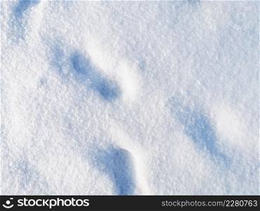 Footprints on white snow, winter concept