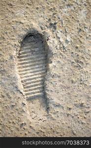 Footstep pattern seen on a concrete background