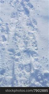 Footsteps on the snow background