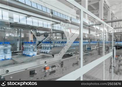 for the production of plastic bottles and bottles on a conveyor belt factory. for the production of plastic bottles factory