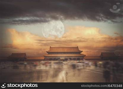 Forbidden City is the largest palace complex in the world. Located in the heart of Beijing . The big moon shines. Forbidden City. The big moon shines
