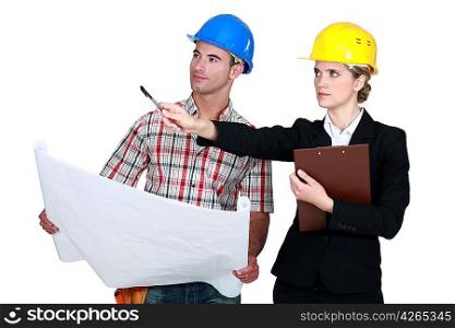 Foreman and architect discussing a project