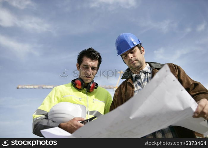 Foreman and colleague at construction site