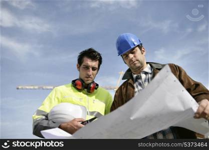 Foreman and colleague at construction site