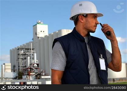 Foreman on site with a walkie talkie