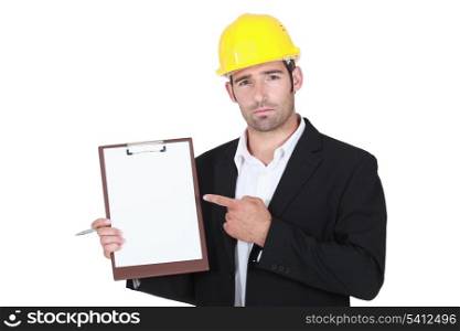 foreman pointing at clipboard