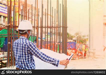 Foreman who oversees the construction work, looks at the work before planning with the construction control team