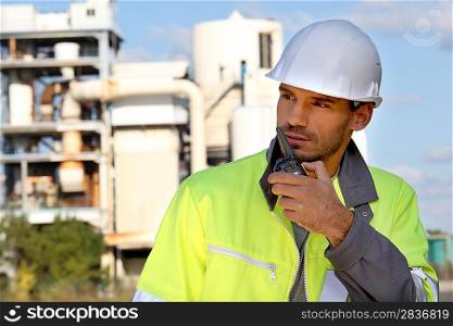 Foreman with a walkie talkie