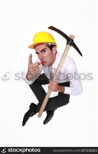 foreman with pickaxe looking authoritative