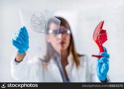 Forensic science expert examining objects from a crime scene