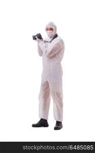 Forensic specialist in protective suit taking photos on white