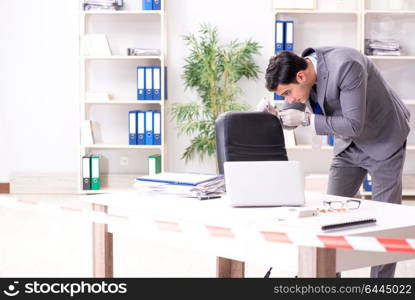 Forensics investigator at the scene of office crime