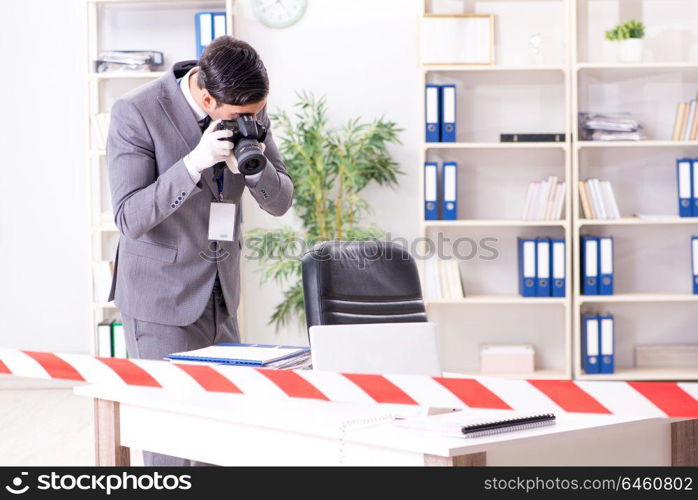 Forensics investigator at the scene of office crime