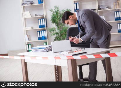 Forensics investigator at the scene of office crime