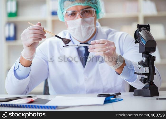 Forensics investigator working in lab on crime evidence