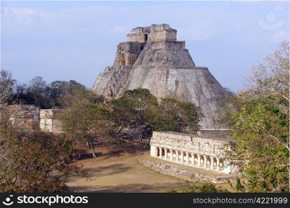 Forest, temple and pyramid in Uxmal, Mexico