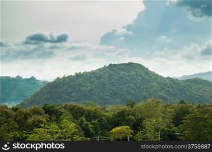Forests, mountains and sky Mountains with forest covered intensively. Sky and Cloud Cover
