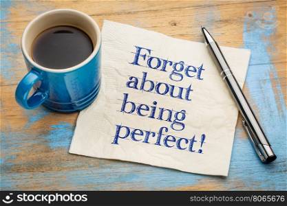 forget about being perfect - advice or reminder - handwriting on a napkin with a cup of coffee