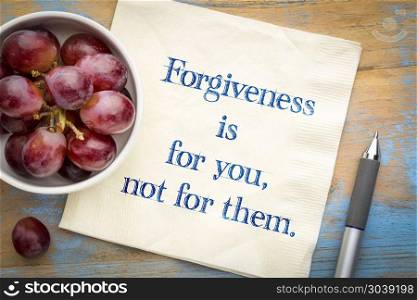 Forgiveness is for your not for them. rgiveness is for your not for them - inspirational handwriitng on a napkin with grapes