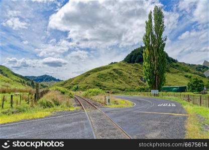 Forgotten World Highway in Taranaki, New Zealand. Lonely scenic highway through farmland in Taranaki, New Zealand
