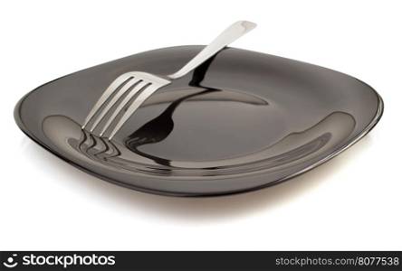 fork at plate isolated on white background