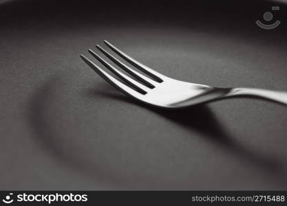 Fork on an empty saucer