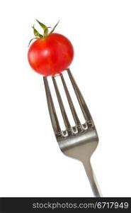 Fork with a little red tomato.Isolated on white background