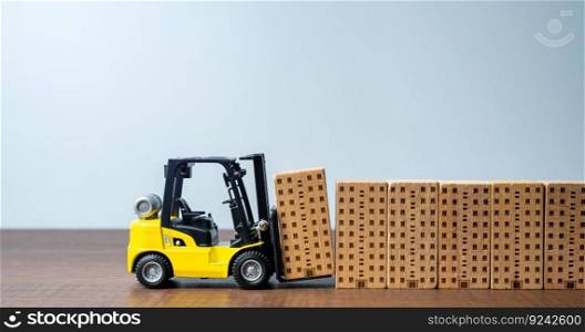 Forklift builds apartment residential buildings. Construction industry. Providing housing infrastructure for growing communities. Progress and development. New housing options become available