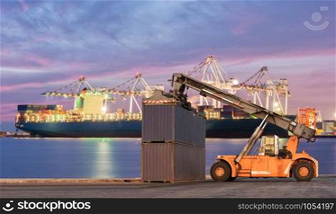 Forklift handling container box loading at port cargo