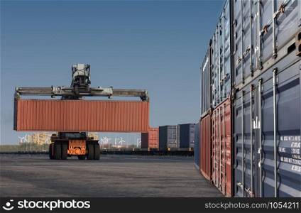 forklift handling container box loading from dock to truck