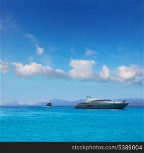 Formentera boats with Ibiza Es Vedra background in Balearic islands
