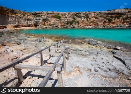 Formentera Cala en Baster in Balearic Islands of Spain with wooden rails