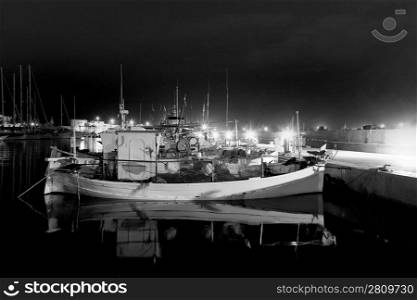 Formentera La savina port marina with traditional fisher boats black and white