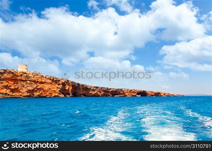 Formentera Raco des Forat with round tower view from sea boat