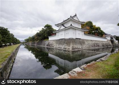 Fortification of Nijojo castle in Kyoto Japan during autumn season. Nijo Castle consists of two concentric rings of fortifications.