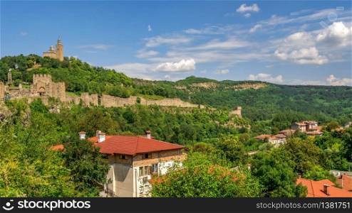 Fortification walls of the Tsarevets fortress in Veliko Tarnovo, Bulgaria. Big size panoramic view on a sunny summer day. Fortification walls of Tsarevets fortress in Veliko Tarnovo, Bulgaria