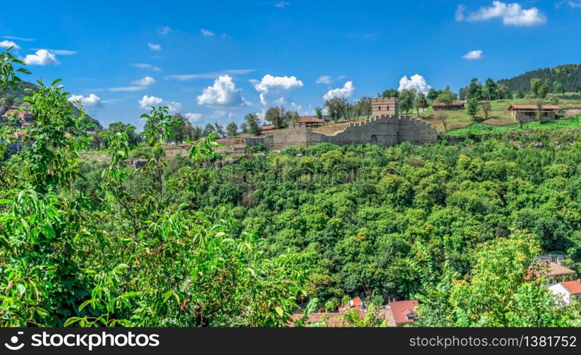 Fortification walls of the Tsarevets fortress in Veliko Tarnovo, Bulgaria. Big size panoramic view on a sunny summer day. Fortification walls of Tsarevets fortress in Veliko Tarnovo, Bulgaria